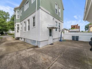 Foreclosed Home - 334 TRENTON AVE, 07503