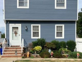 Foreclosed Home - 79 NOTTINGHAM AVE, 11580