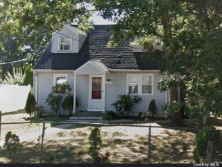 Foreclosed Home - 1442 N CLINTON AVE, 11706