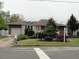 Foreclosed Home - 318 E 4TH ST, 11729