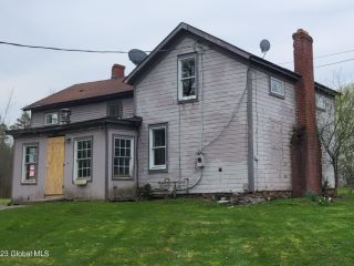 Foreclosed Home - 7110 E TAFT RD, 13057