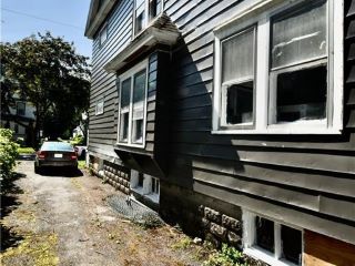 Foreclosed Home - 124 W CALTHROP AVE, 13205
