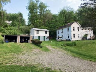 Foreclosed Home - 210 RAILROAD ST, 15057