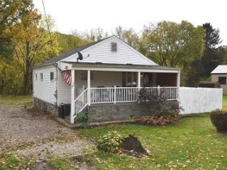 Foreclosed Home - 707 MILLERS RUN RD, 15057