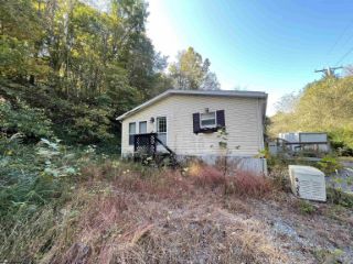 Foreclosed Home - 147 PAW PAW EST, 26588