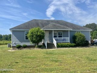 Foreclosed Home - 235 S CURRITUCK RD, 27929