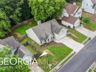 Foreclosed Home - 1077 WOODSONG PASS CT, 30043