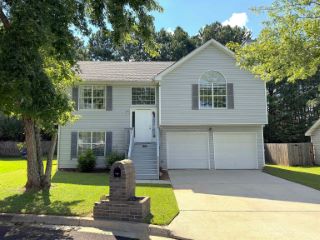 Foreclosed Home - 5643 WELLBORN CREEK DR, 30058
