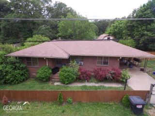 Foreclosed Home - 1431 SMYRNA RD SW, 30094