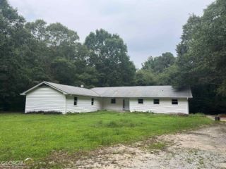 Foreclosed Home - 1300 STILLMEADOW RD SW, 30094