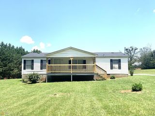 Foreclosed Home - 941 W MOORES CROSSING RD, 30286