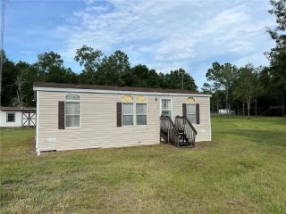 Foreclosed Home - 14520 NW 21ST CT, 32113