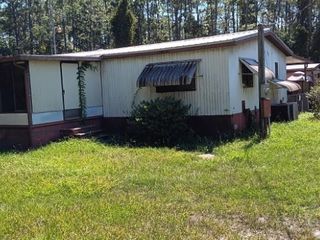 Foreclosed Home - 430 PLANTATION PINES DR, 32139