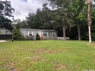 Foreclosed Home - 145 NE 35TH PL, 32609