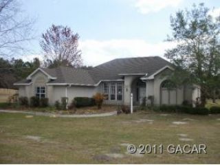 Foreclosed Home - 12421 SW 28TH PL, 32618
