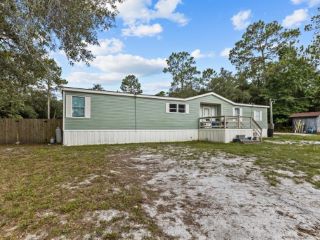 Foreclosed Home - 8910 NW 125TH ST, 32626