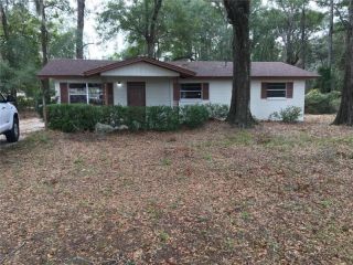 Foreclosed Home - 20202 N US HIGHWAY 441, 32643