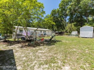 Foreclosed Home - 7100 PEACH ST, 32656