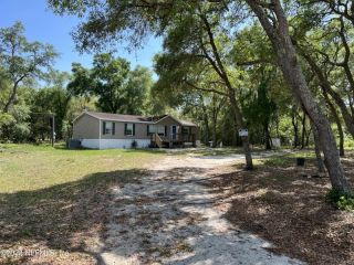 Foreclosed Home - 5535 SMITH DR, 32656
