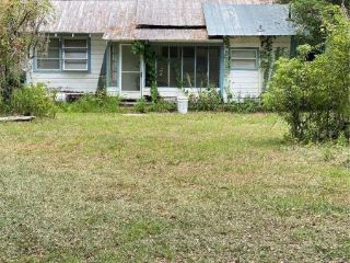 Foreclosed Home - 21098 NW 59TH AVE, 32667
