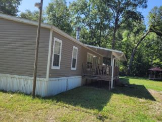 Foreclosed Home - 56 NE 717TH ST, 32680
