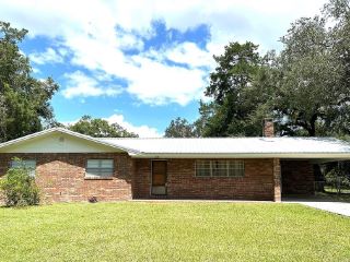 Foreclosed Home - 309 SW 5TH AVE, 32693