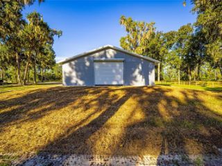 Foreclosed Home - 14980 W HIGHWAY 318, 32696