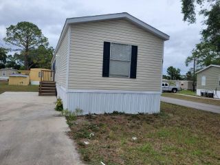Foreclosed Home - 101 W SEAFLOWER ST, 32712