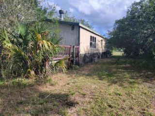 Foreclosed Home - 637 CAMP RD, 32927