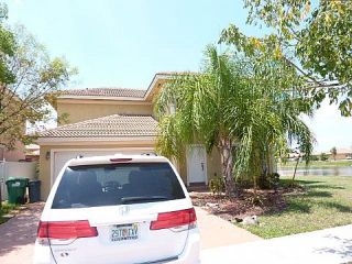 Foreclosed Home - 19870 NW 77TH CT, 33015