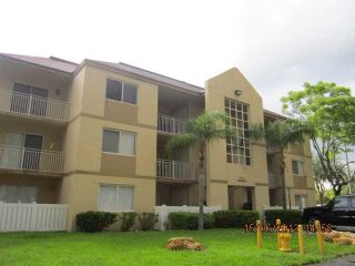 Foreclosed Home - 18820 NW 57TH AVE APT 204, 33015