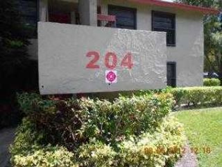 Foreclosed Home - 204 LAKE POINTE DR APT 108, 33309