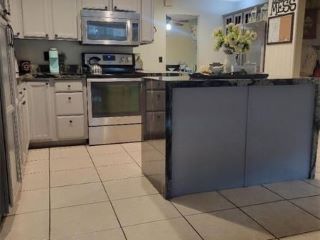 Foreclosed Home - 6340 NW 32ND AVE, 33309