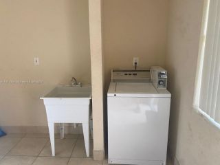 Foreclosed Home - 2506 NW 21ST ST # 2508, 33311