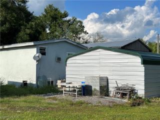 Foreclosed Home - 830 N ZAMBRIA ST, 33440