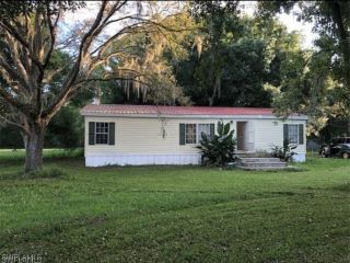 Foreclosed Home - 808 WOODLAND BLVD, 33440
