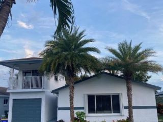 Foreclosed Home - 508 NW 52ND ST, 33487