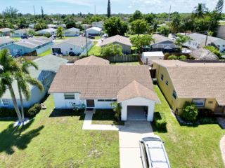 Foreclosed Home - 556 NW 54TH ST, 33487