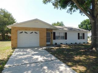 Foreclosed Home - 7203 OMEGA CT, 33540