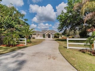 Foreclosed Home - 5503 LAKE LE CLARE RD, 33558