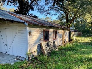 Foreclosed Home - 12129 GROVEWOOD AVE, 33592