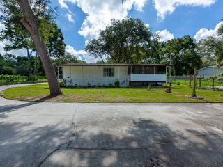Foreclosed Home - 11930 GROVEWOOD AVE, 33592