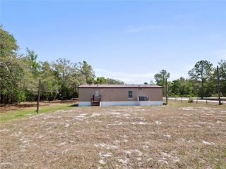 Foreclosed Home - 35423 HOLMES ST, 33597