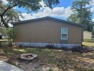 Foreclosed Home - 9334 PARADISE DR, 33610