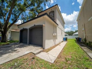 Foreclosed Home - 8329 W HANNA AVE, 33615