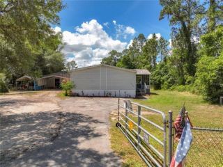 Foreclosed Home - 2749 HUGGINS RD, 33898