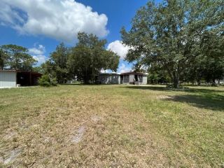 Foreclosed Home - 1541 TIGER LAKE RD, 33898