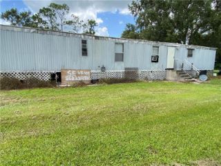 Foreclosed Home - 1237 S CARLYLE ST, 33935