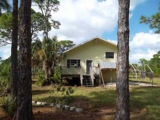 Foreclosed Home - 8875 WHISPERING PINES DR, 33956