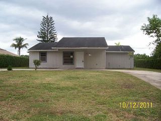 Foreclosed Home - 1057 SW ABINGDON AVE, 34953
